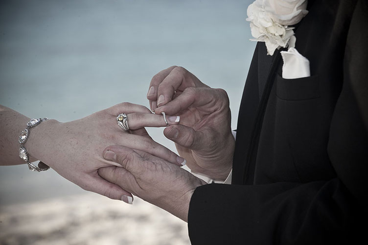 Ring ceremony on a beach in the Bahamas