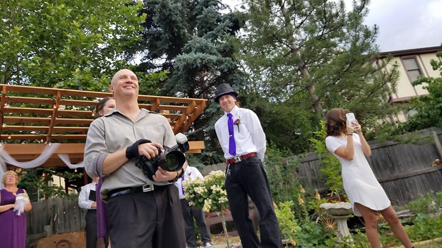 Brody Hall photographing a wedding in Denver, CO