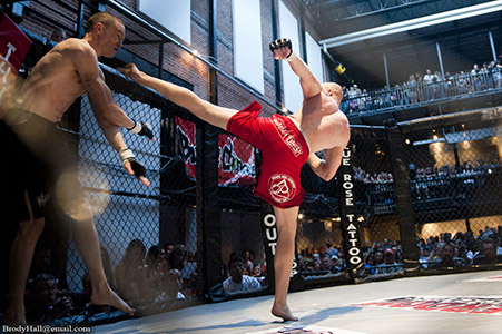 Spinning back kick during a MMA fight