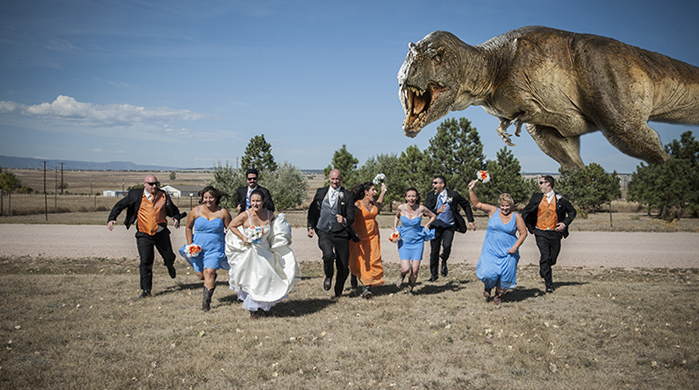 Wedding party running from a T-rex