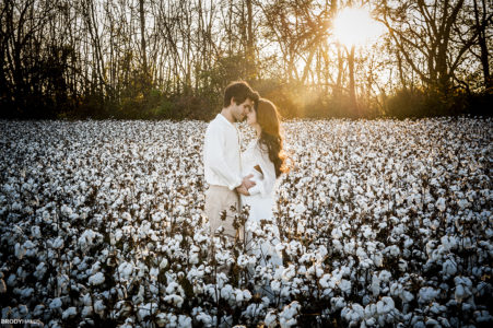 MAria and Christian in the cotton field with the sunset