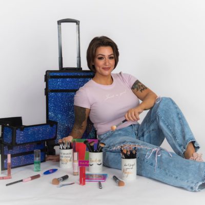 Vivienne Blair leaning back on her make-up kit.