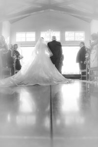 Back of Bride being escorted down the aisle by her father in Nasvhille wedding