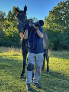 Photographing out in a Nashville field with a horse hanging over my shoulder.