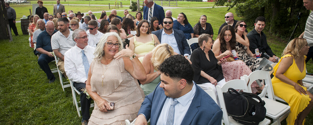 Wedding guest taking their seats prior to the wedding.